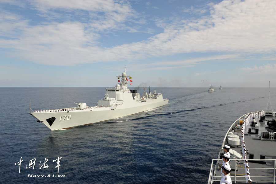 The combat-readiness cruise and high-sea training taskforce under the South China Sea Fleet of the Navy of the Chinese People's Liberation Army (PLA) arrived at the waters off the Zengmuansha Reef of the Nansha Islands and held a grand oath-taking ceremony on March 26, 2013.(chinamil.com.cn/Qian Xiaohu and Song Xin)