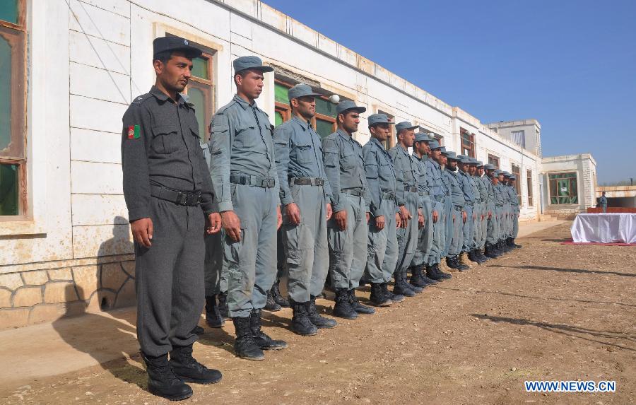 Afghan newly attend their graduation ceremony in Sari Pul province in northern Afghanistan on March 28, 2013. A total of 33 Afghan policemen graduated on Thursday after two-month training in Sari Pul province, police officials said. (Xinhua/Arui)