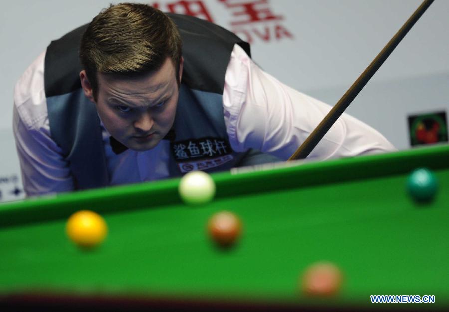 Shaun Murphy of England competes during the semifinal match against compatriot Mark Selby at the 2013 World Snooker China Open in Beijing, China, March 30, 2013. Murphy lost the match 2-6. (Xinhua/Gong Lei)