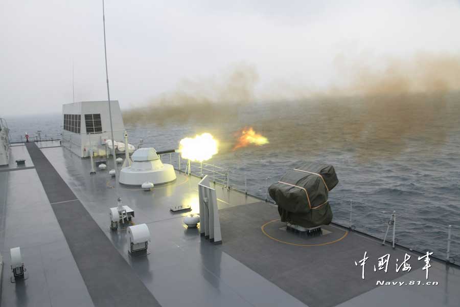 A warship of a joint maneuver taskforce under the South Sea Fleet of the Chinese People's Liberation Army (PLA) Navy conducts a live-ammunition fire drill in the west Pacific Ocean on March 31, 2013. (navy.81.cn/Qian Xiaohu, Song Xin, Gan Jun and Gao Yi)