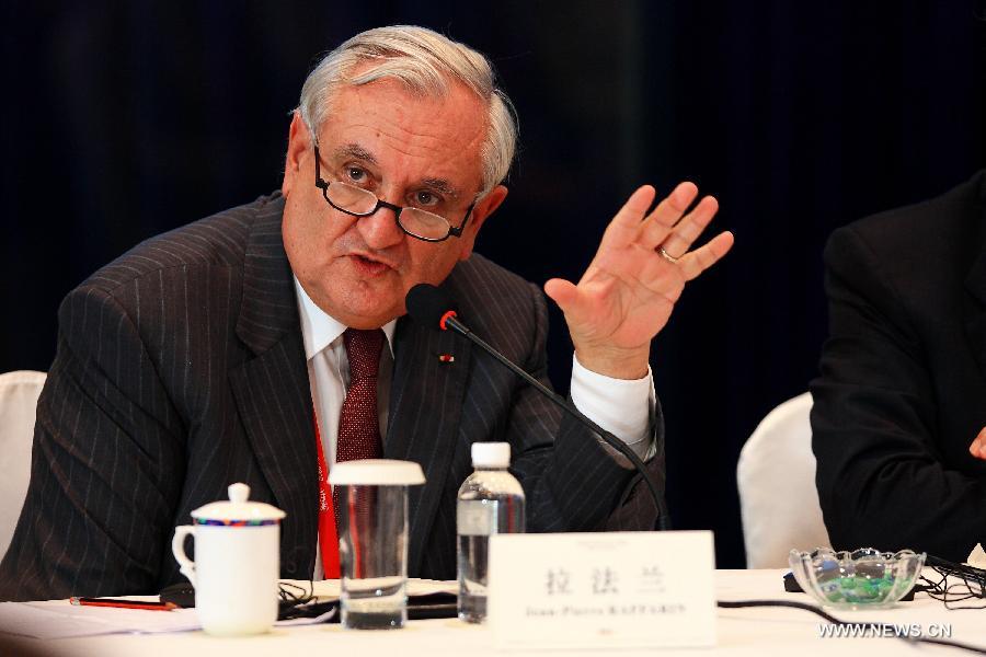 Jean-Pierre Raffarin, former prime minister of France, speaks during a roundtable discussion themed in "Structural Reform: Revitalize the Core Competitiveness of EU" during the Boao Forum for Asia (BFA) Annual Conference 2013 in Boao, south China's Hainan Province, April 7, 2013. (Xinhua/Xu Zijian) 