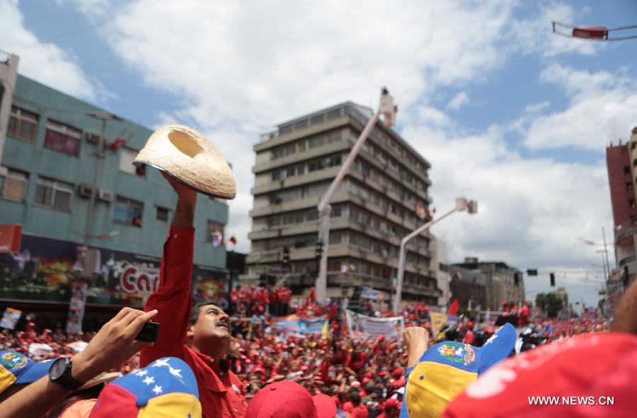 Image provided by Hugo Chavez Campaign Command shows Venezuelan Acting President and presidential candidate Nicolas Maduro attending a campaign in Maturin, Monagas State, Venezuela, on April 8, 2013. Venezuela will held presidential elections on April 14. (Xinhua/Hugo Chavez Campaign Command) 