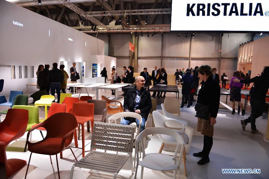 People visit at the Milan International Furniture Fair in Milan, Italy, on April 9, 2013. The 52nd edition of Milan's annual furniture fair is taking place from April 9 to 14. (Xinhua/Xu Nizhi) 