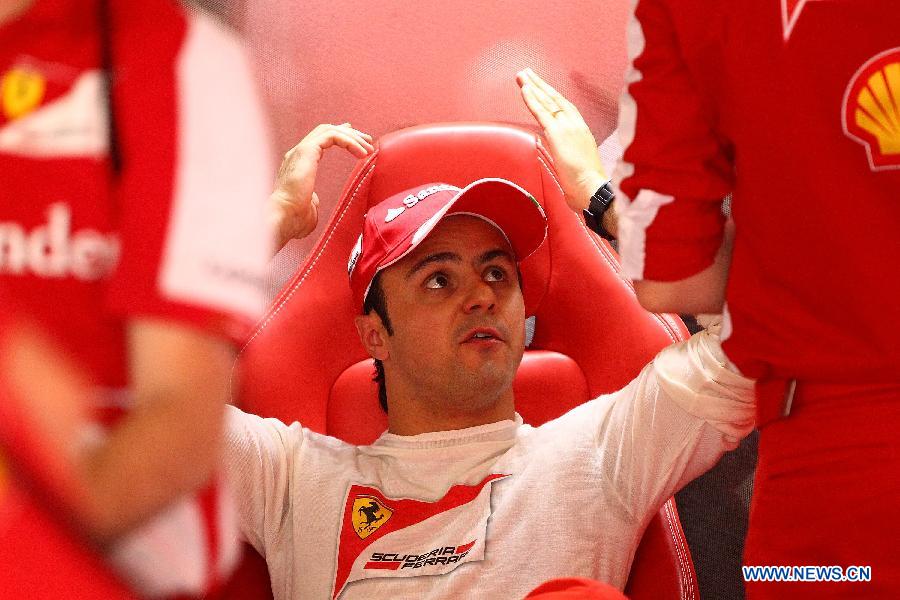Ferrari driver Felipe Massa reacts after the first practice session of the Chinese F1 Grand Prix at the Shanghai International circuit, in Shanghai, east China, on April 12, 2013. (Xinhua/Li Ming)
