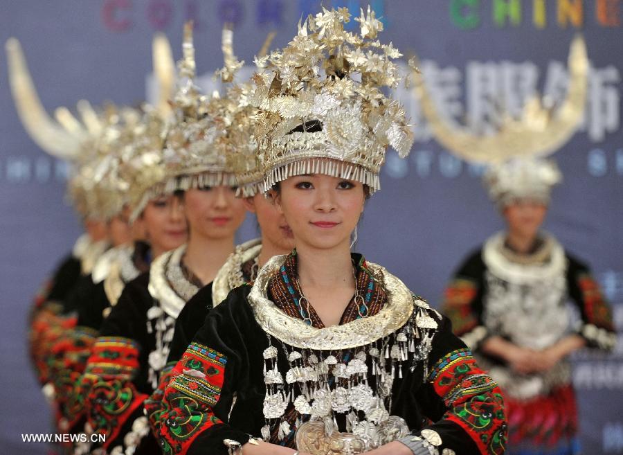Models present costumes of the Miao ethnic group at the Guangxi Museum of Nationalities in Nanning, capital of south China's Guangxi Zhuang Autonomous Region, April 12, 2013. A total of 210 set of traditional costumes of the Miao ethnic group went on display here on Friday. Costumes of the Miao ethnic group is well known for its fine craftsmanship, brilliant colors, various styles and rich cultural connotations. (Xinhua/Lu Boan)