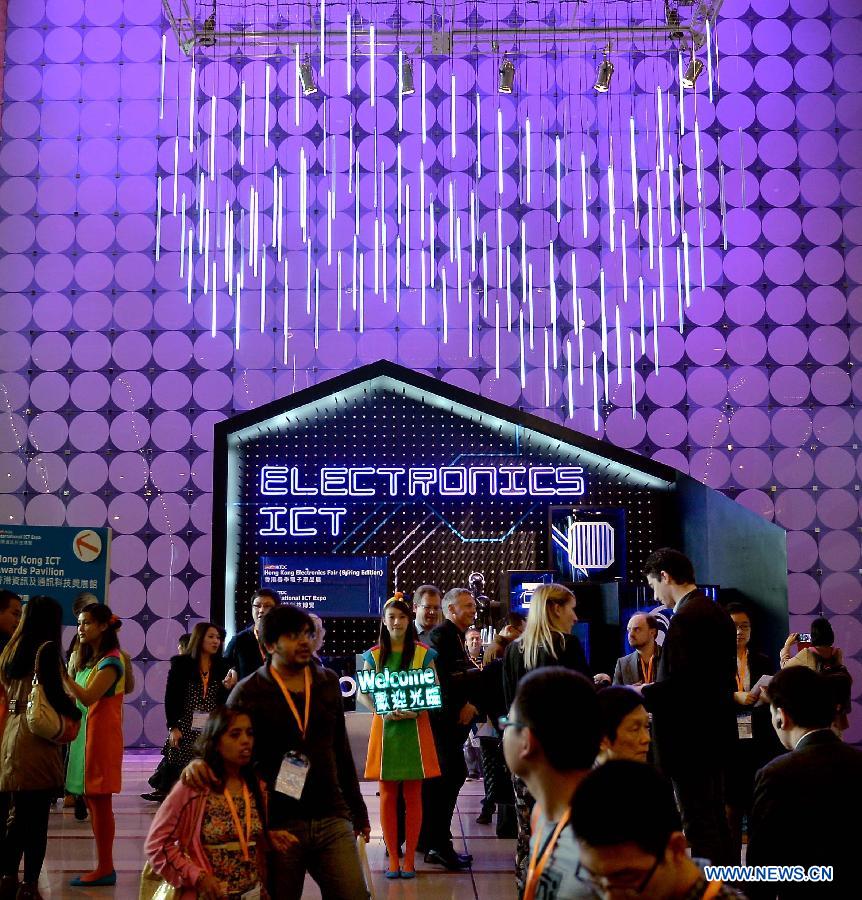 People visit the 10th Hong Kong Electronics Fair (Spring Edition) in south China's Hong Kong, April 13, 2013. The four-day fair, which kicked off on Saturday, attracted 3,250 enterprises from 24 countries and regions. (Xinhua/Chen Xiaowei) 