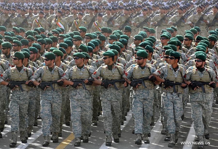Soldiers march during the Army Day parade in Tehran, Iran, April 18, 2013. Iranian President Mahmoud Ahmadinejad said that the Iranians will maintain security of the Persian Gulf through a collective work of regional states. (Xinhua/Abolfazl Nesaei) 