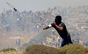 Palestinian protesters clash with Israeli soldiers