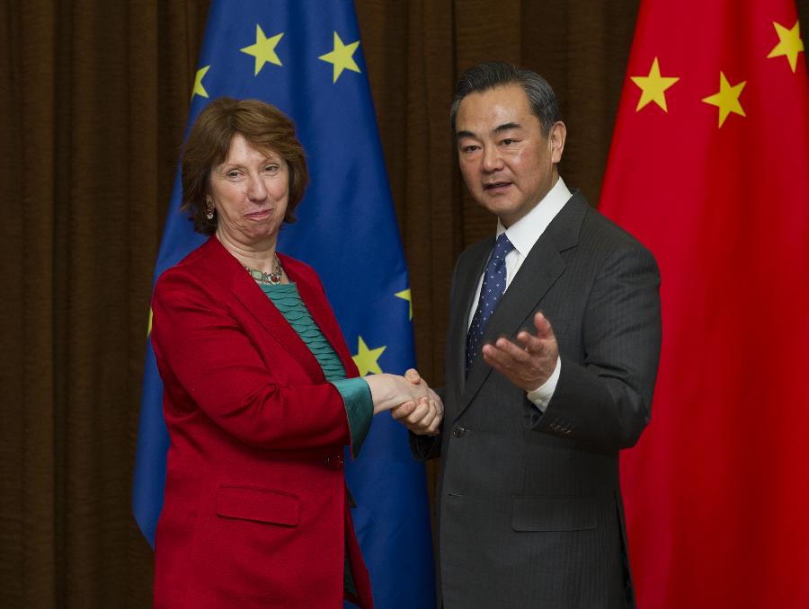 Chinese Foreign Minister Wang Yi (R) shakes hands with Catherine Ashton, High Representative of the European Union (EU) for Foreign Affairs and Security Policy, during their talks in Beijing, capital of China, April 27, 2013. (Xinhua/Xie Huanchi)