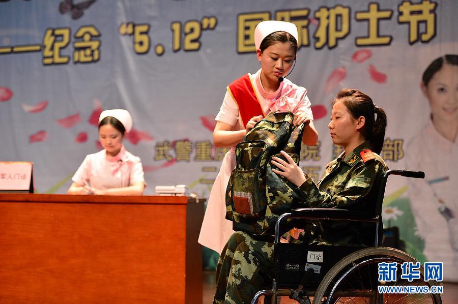 A celebration of the International Nurses Day is held in the culture activity center of Chongqing Armed Police Corps Hospital on May 7, 2013. (Xinhua/Zhang Chunhua)