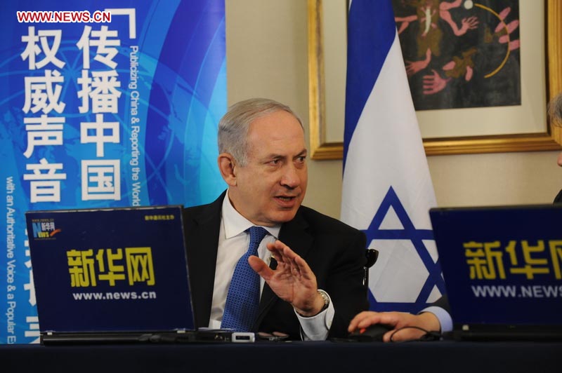 Visiting Israeli Prime Minister Benjamin Netanyahu talks during an exclusive online interview with Xinhuanet, the official website of Xinhua News Agency, in Beijing, May 8, 2013. (Xinhuanet Photo)