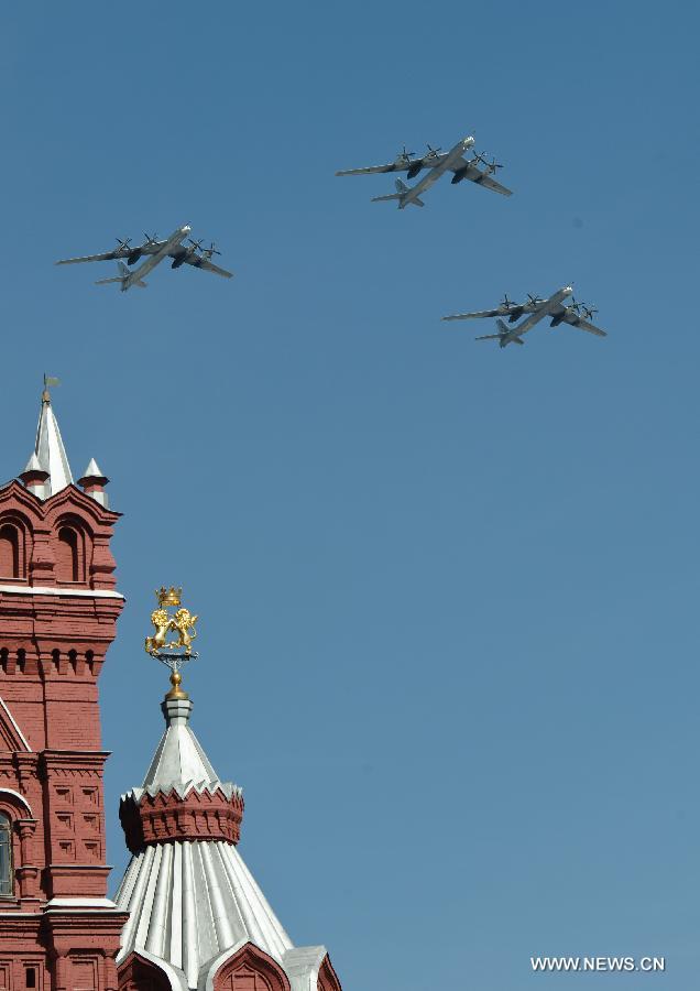 TU-95 strategic bombers take part in a Victory Day parade at the Red Square in Moscow, Russia, May 9, 2013. A grand parade was held on Thursday at the Red Square to mark the 68th anniversary of the Soviet Union's victory over Nazi Germany in the Great Patriotic War.(Xinhua/Jiang Kehong)