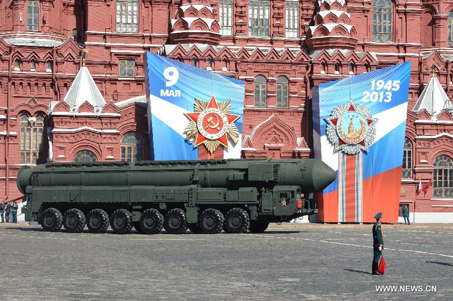 Russian Topol-M missile launchers take part in a Victory Day parade at the Red Square in Moscow, Russia, on May 9, 2013. A grand parade was held on Thursday at the Red Square to mark the 68th anniversary of the Soviet Union's victory over Nazi Germany in the Great Patriotic War. (Xinhua/Jiang Kehong)