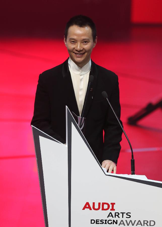 Award winner Shen Wei delivers a prize speech during the awarding ceremony of the 2nd Audi Arts and Design Award in Beijing, capital of China, May 9, 2013. Founded in 2010, the Audi Arts and Design Award is a cross-discipline award that focuses on Chinese contemporary arts and design. (Xinhua/Meng Yongmin) 
