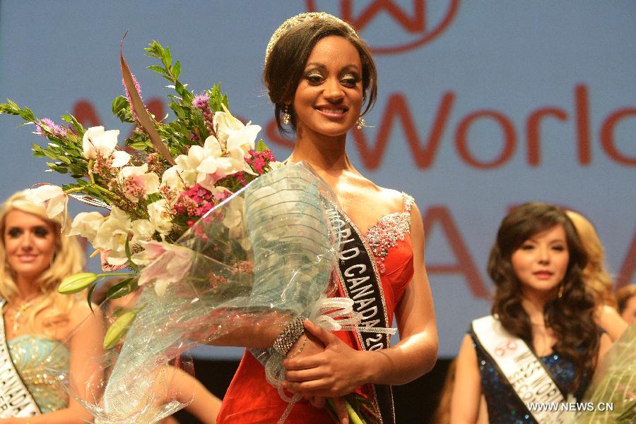 Camille Munro of Regina, Saskatchewan, poses after being crowned as Miss World Canada 2013 on May 9, 2013 in Richmond, BC, Canada. She will represent Canada at Miss World 2013 in Jakarta, Indonesia, in September. (Xinhua/Sergei Bachlakov)