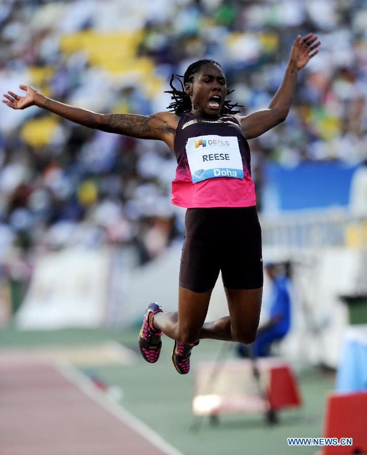 Brittney Reese of the United States jumps during the women's long jump final at the IAAF Diamond League in Doha, capital of Qatar, May 10, 2013. Reese claimed the title of the event with 7.25 metres. (Xinhua/Chen Shaojin)