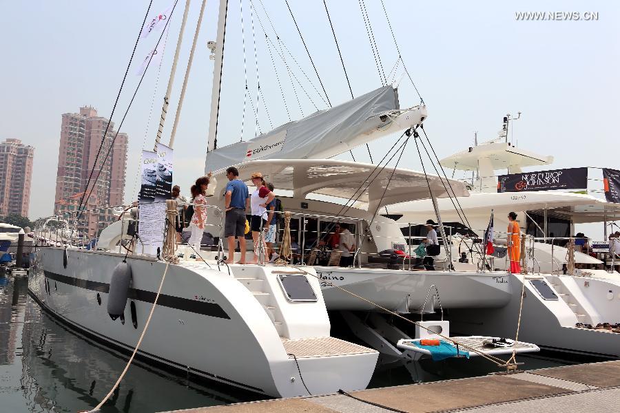 Photo taken on May 11, 2013 shows a yacht at an exhibition held by the Gold Coast Yacht Country Club in Hong Kong, south China. The exhibition has attracted 70 exhibitors around the world with their luxurious yachts as well as a fancy lifestyle at sea. (Xinhua/Li Peng)