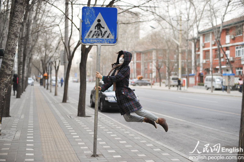 Levitating Beijinger. Photo Taken on March 23, 2013. (Photo/CFP)