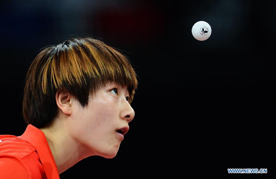 Ding Ning of China competes during the women's singles first round match against Zhenhua Dederko of Australia at the 2013 World Table Tennis Championships in Paris, France, May 15, 2013. Ding Ning won 4-0. (Xinhua/Tao Xiyi)