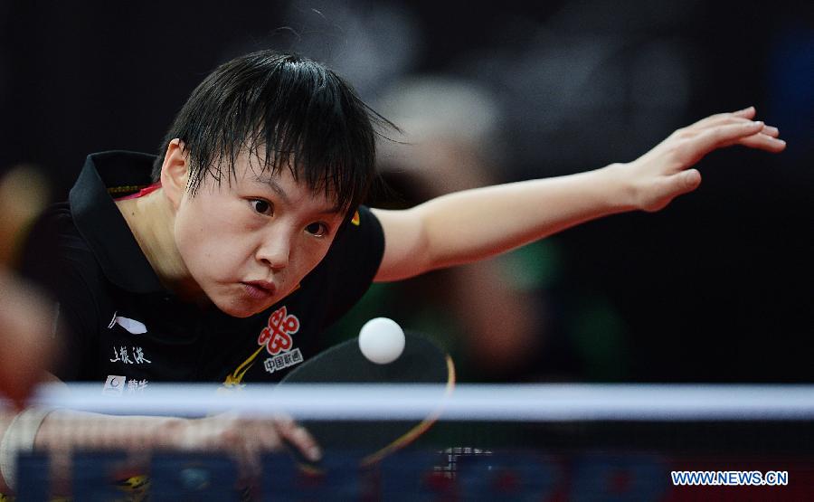 Hu Limei of China competes during the women's singles first round match against Georgina Pota of Hungary at the 2013 World Table Tennis Championships in Paris, France, May 15, 2013. Hu Limei won 4-0. (Xinhua/Tao Xiyi)