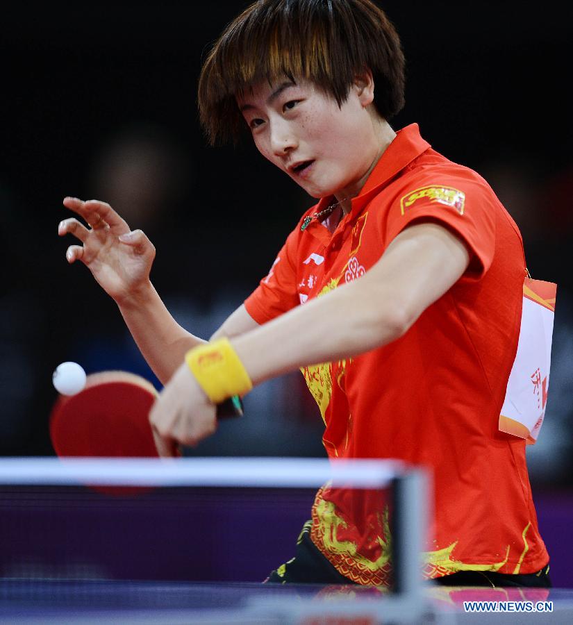 Ding Ning of China competes during the women's singles first round match against Zhenhua Dederko of Australia at the 2013 World Table Tennis Championships in Paris, France, May 15, 2013. Ding Ning won 4-0. (Xinhua/Tao Xiyi)