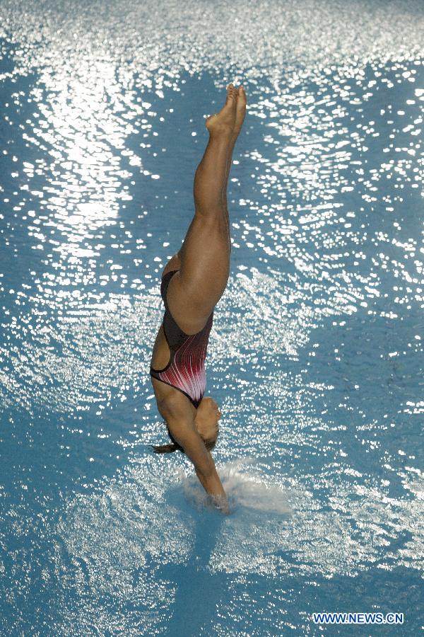 Canadian diver Jennifer Abel competes in the women's 3m springboard single semifinals during the fifth stage of the Diving World Series of International Swimming Federation (FINA) in Guadalajara, Jalisco, Mexico, on May 18, 2013. (Xinhua/Alejandro Ayala)