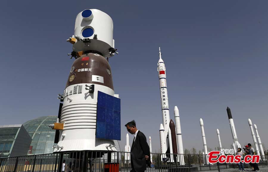 Models of rockets and spacecrafts are seen at the Garden Expo Park in Fengtai District, Beijing, May 19, 2013. The Ninth China (Beijing) International Garden Expo kicked off on Saturday. Garden designs from 69 Chinese cities and 29 countries will be presented. (CNS/Liu Guanguan)
