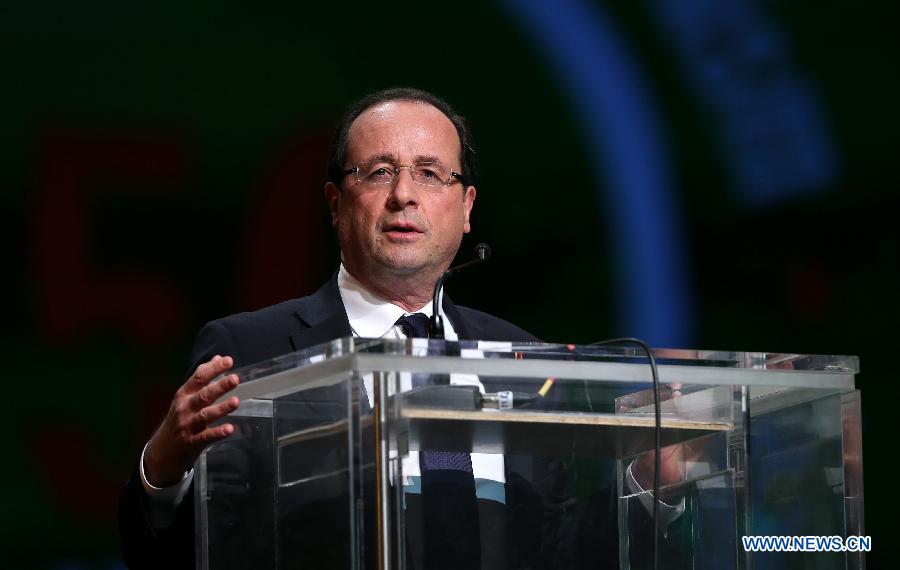 French President Francois Hollande addresses the ceremony to mark the 50th anniversary of the founding of the African Union, the successor of the Organisation of African Unity (OAU), in Addis Ababa, Ethiopia, on May 25, 2013. (Xinhua/Meng Chenguang)