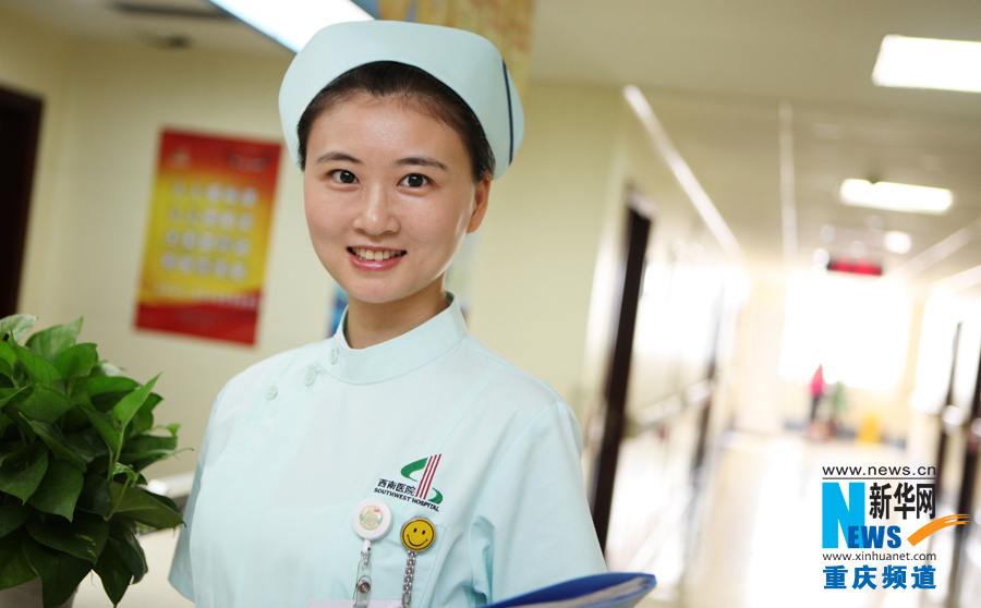 Liu Sha, born in 1981, is a matron in Chongqing South West Hospital. (Xinhua/Peng Bo)
