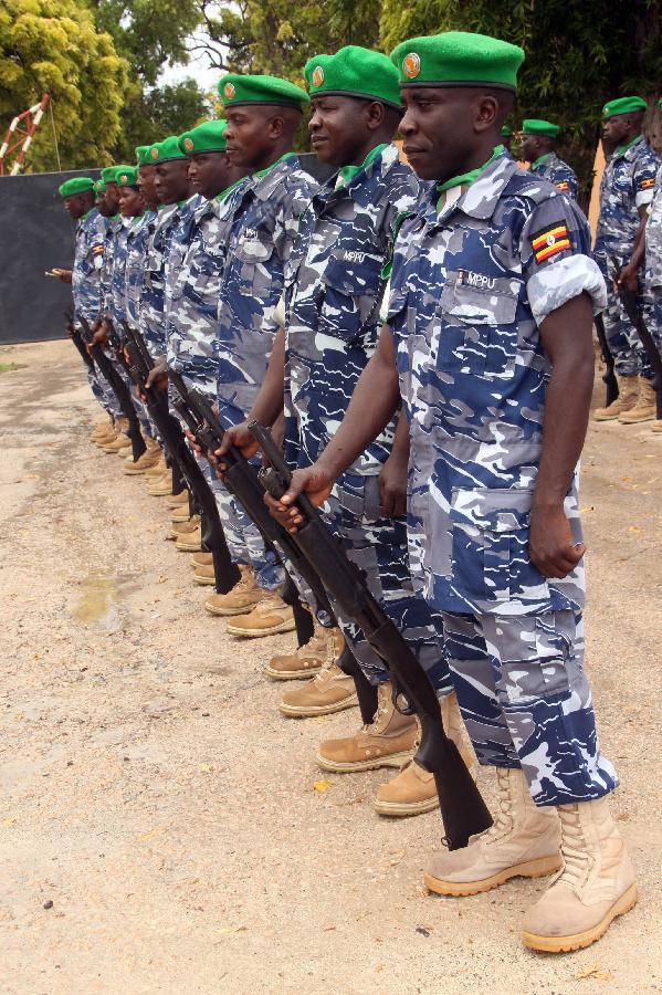 Police Units of the African Union Mission in Somalia (AMISOM) stand in position after concluding training in the Somali capital Mogadishu Thursday May 30, 2013. The AMISOM police force, part of the nearly-20,000-member AU peacekeeping mission, are expected to be deployed along with local police. (Xinhua/Faisal Isse) 