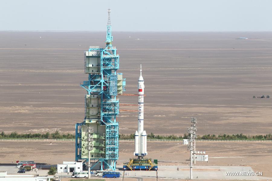 The manned Shenzhou-10 spacecraft is ready for the launch at the Jiuquan Satellite Launch Center in Jiuquan, northwest China's Gansu Province, June 11, 2013. (Xinhua/Wang Jianmin)  
