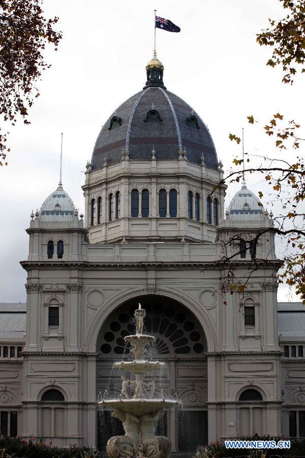 Photo taken on June 12, 2013 shows the Royal Exhibition Building and its surrounding Carlton Gardens in Melbourne, Australia. The Royal Exhibition Building and its surrounding Carlton Gardens were designed for the great international exhibitions of 1880 and 1888 in Melbourne. The Building is constructed of brick and timber, steel and slate. It combines elements from the Byzantine, Romanesque, Lombardic and Italian Renaissance styles. The Royal Exhibition Building and Carlton Gardens were listed by United Nations Educational, Scientific and Cultural Organization (UNESCO) as a world heritage in 2004. (Xinhua/Xu Yanyan) 