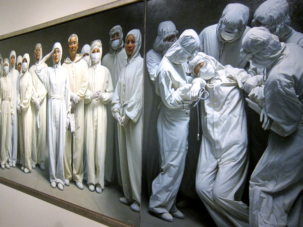 The photorealistic "Fight Against SARS" by Zhao Zhenhua at the National Art Museum of China. [Photo: CRIENGLISH.com/William Wang]          