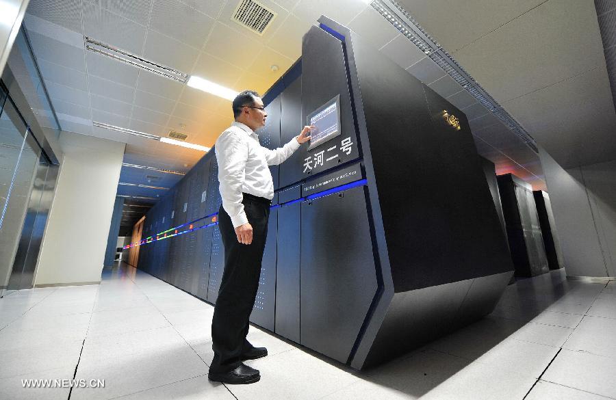 Photo taken on June 16, 2013 shows the supercomputer Tianhe-2 developed by China's National University of Defense Technology. The supercomputer Tianhe-2, capable of operating as fast as 33.86 petaflops per second, was ranked on Monday as the world's fastest computing system, according to TOP500, a project ranking the 500 most powerful computer systems in the world. (Xinhua/Long Hongtao)
