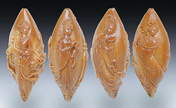 Traditional carvers shape kernels of art