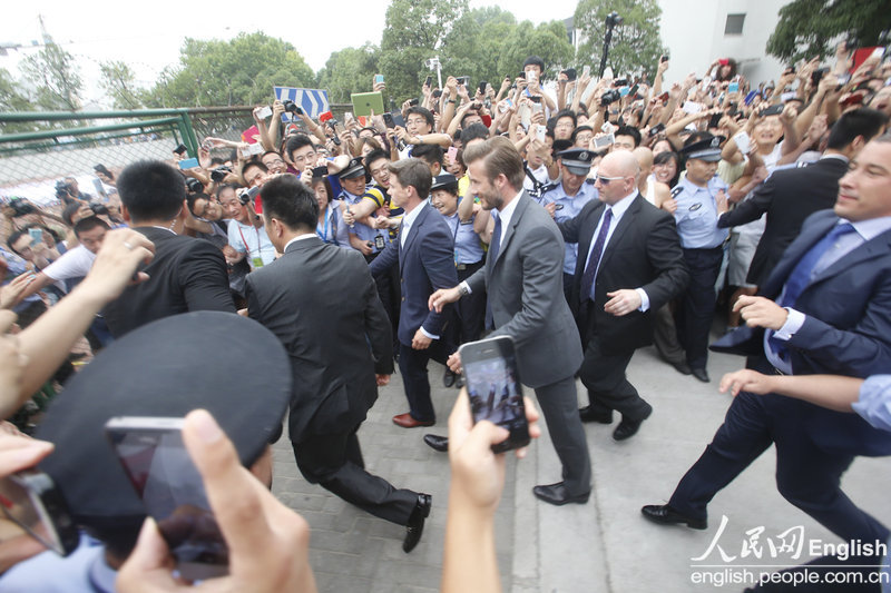 Beckham visits Shanghai as ambassador to the Chinese Super League, and his appearance in Tongji University on Thursday ignites crowd stampede, leaving at least five people injured. (Photo/CFP)