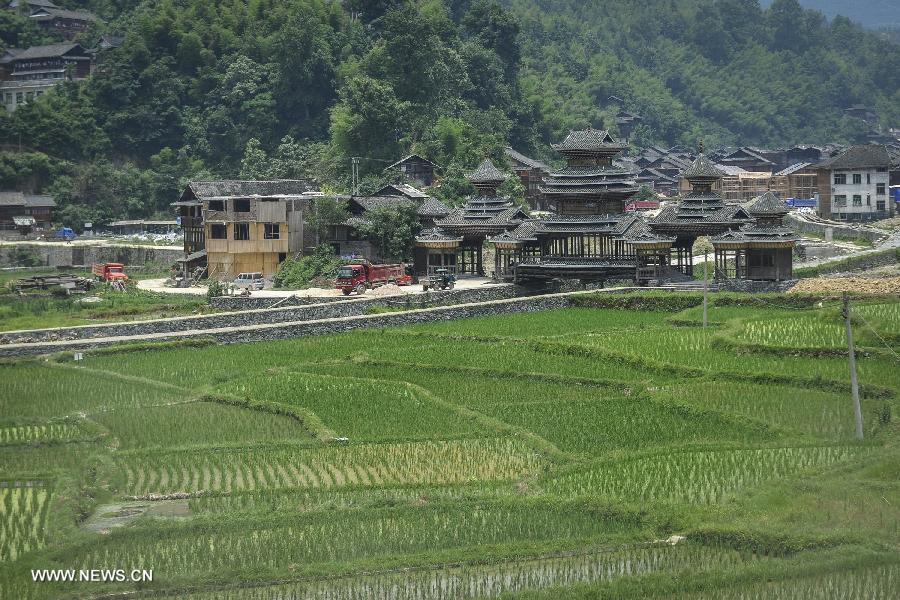 Photo taken on June 20, 2013 shows the scenery of Zhaoxing Dong Village in Liping County, southwest China's Guizhou Province. Zhaoxing Dong Village is one of the largest Dong village in Guizhou. In 2005, it was ranked one of China's six most beautiful villages and towns by Chinese National Geography. (Xinhua/Ou Dongxu)