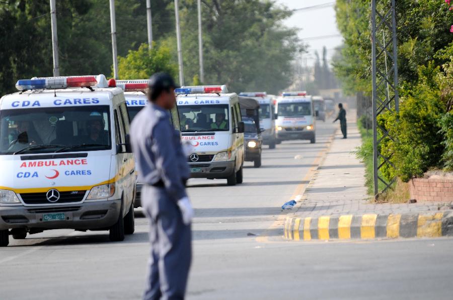 Ambulances transporting bodies of foreign tourists leave Chaklala Airbase in Rawalpindi, Pakistan, on June 23, 2013. Two Chinese nationals and one Chinese American were among the 11 people killed in a pre-dawn terrorist attack in Pakistan's northern area of Gilgit-Baltistan on Sunday, the Chinese Embassy in Pakistan told Xinhua. (Xinhua/Ahmad Kamal)