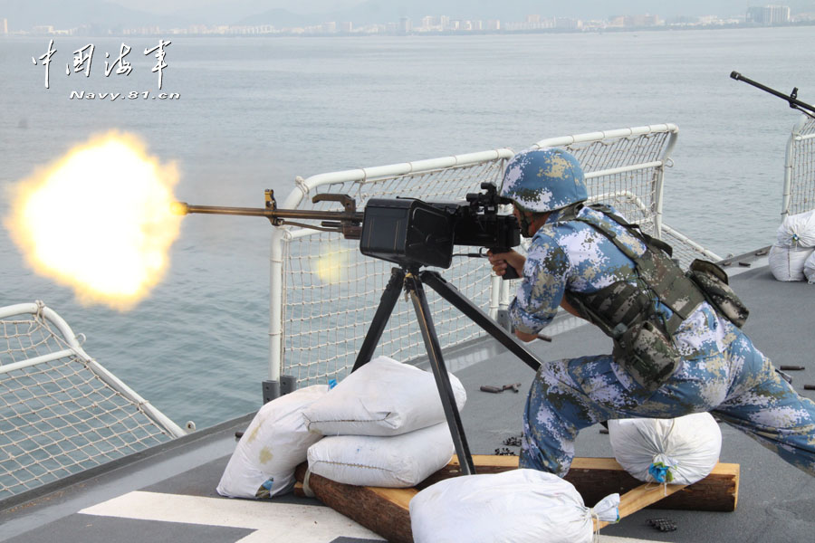 A special operation detachment under a marine brigade of the Chinese People's Liberation Army Navy (PLAN) conducts a joint escorting training with a landing ship flotilla of the PLAN on the high-risk subjects, such as climbing boarding, cabin search, sea blockade and arresting pirates. (China Military Online/ Sun Haichao and Jiang Zhengyuan)