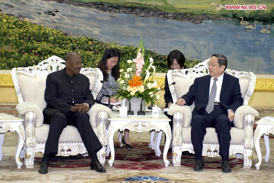 Yu Zhengsheng (R, front), chairman of the National Committee of the Chinese People's Political Consultative Conference (CPPCC), meets with Jean-Marie Tassoua (L, front), president of the Economic and Social Council of the Republic of Congo, in Beijing, capital of China, June 26, 2013. (Xinhua/Xie Huanchi)