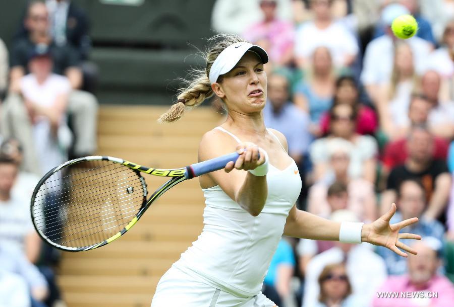 Eugenie Bouchard of Canada competes during the second round of ladies' singles against Ana Ivanovic of Serbia on day 3 of the Wimbledon Lawn Tennis Championships at the All England Lawn Tennis and Croquet Club in London, Britain on June 26, 2013. Bouchard won 2-0.(Xinhua/Tang Shi)