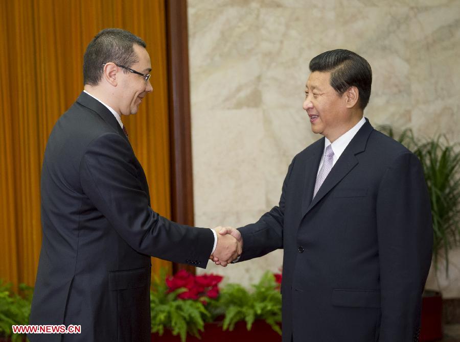 Chinese President Xi Jinping (R) meets with Romanian Prime Minister Victor Ponta in Beijing, capital of China, July 2, 2013. Ponta is visiting China to attend a conference for local leaders from China and central and east European countries that will be held in southwest China's Chongqing Municipality from July 2 to 4. (Xinhua/Xie Huanchi)