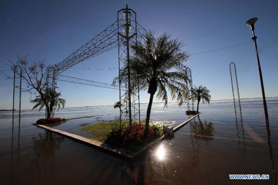 A structure is submerged at Paso de la Patria of Corrientes province, Argentina, on July 1, 2013. The village, a tourist resort, has been affected by the Parana River's second highest water level in 15 years, according to local press. (Xinhua/German Pomar/TELAM) 