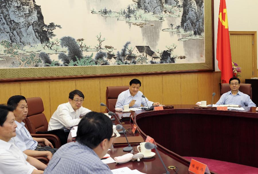 Liu Yunshan (2nd R), a member of the Standing Committee of the Political Bureau of the Communist Party of China (CPC) Central Committee, presides over the second meeting of a leading team of a campaign aimed to strengthen the ties between the CPC and the public, in Beijing, capital of China, July 5, 2013. (Xinhua/Rao Aimin)