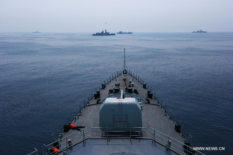 Chinese and Russian warships are seen during the "Joint Sea-2013" drill at Peter the Great Bay in Russia, July 9, 2013. Chinese and Russian warships carried out a variety of exercises including joint air defense, maritime supply, joint escort and the rescue of hijacked vessels during the second day of "Joint Sea-2013" drill. (Xinhua/Zha Chunming)