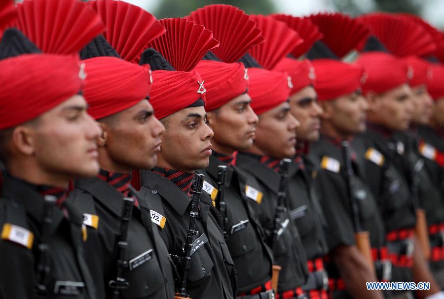 New recruits of Indian army take part in a passing out parade at an army base on the outskirts of Srinagar, the summer capital of Indian-controlled Kashmir, July 10, 2013. The 494 recruits from Indian-controlled Kashmir were formally inducted into the Indian army's Jammu Kashmir Light Infantry (JAKLI) regiment after rigorous training. (Xinhua/Javed Dar)
