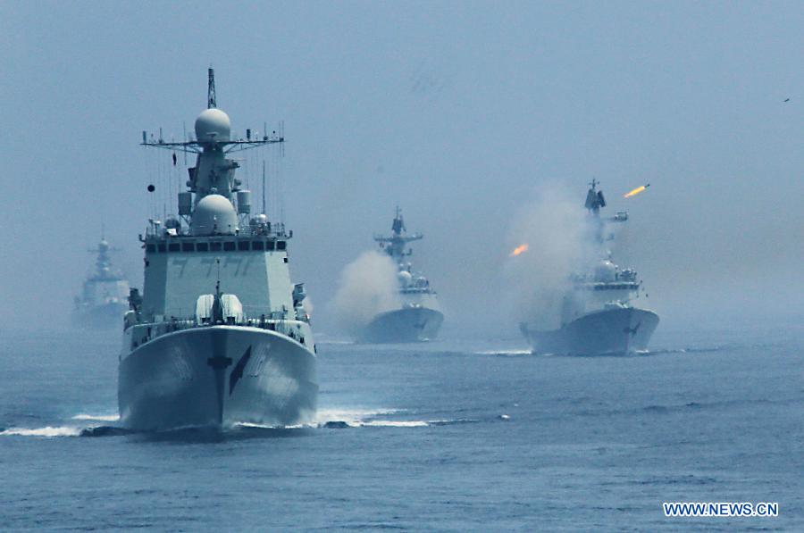 Chinese naval vessel fire anti-submarine missile during the "Joint Sea-2013" drill at Peter the Great Bay inRussia, July 10, 2013. The "Joint Sea-2013" drill participated by Chinese and Russian warships concluded here on Wednesday. (Xinhua/Zha Chunming)