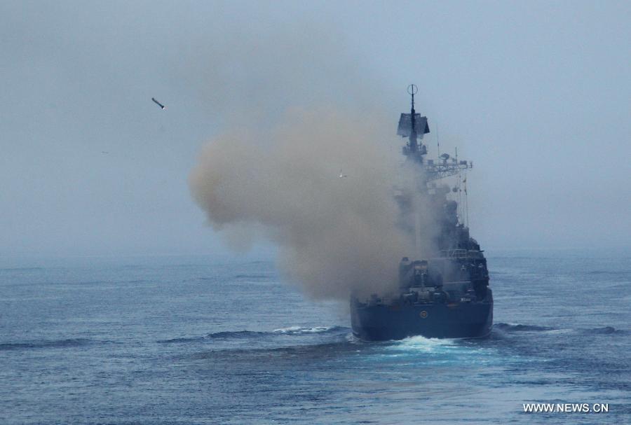 Russian naval vessel fire anti-submarine missile during the "Joint Sea-2013" drill at Peter the Great Bay in Russia, July 10, 2013. The "Joint Sea-2013" drill participated by Chinese and Russian warships concluded here on Wednesday. (Xinhua/Zha Chunming)