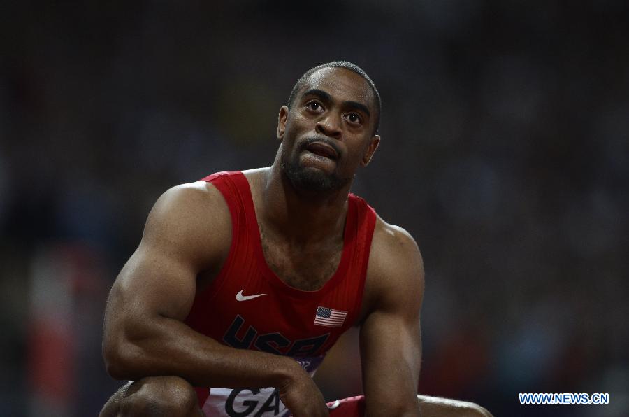 Tyson Gay of the U.S. reacts after finishing fourth in the men's 100m final during the London 2012 Olympic Games at the Olympic Stadium in this August 5, 2012 file photo. Track and field was dealt with a huge blow Sunday when the world's top sprinters failed drug tests. They are former world record holder Jamaican Asafa Powell, American champion Tyson Gay and Olympic medalist Sherone Simpson. (Xinhua/Reuter Photos)