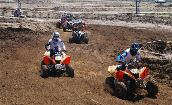 All-terrain vehicle riders from across the globe geared up for the China ATVs and International Invitational Tournament on July 21, 2013 in Dongying city, Shandong province.(Source:China Daily/ Photo:Xinhua)　